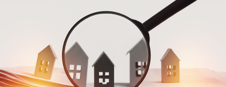 Magnifying glass magnifying 5 house model icons