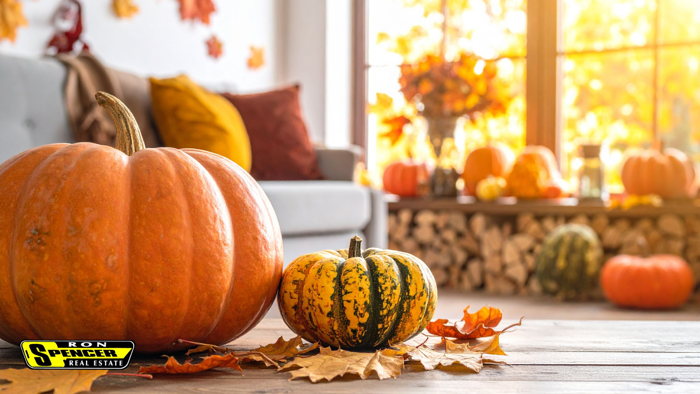 Front porch with orange and green pumpkins and leaves for Autumn