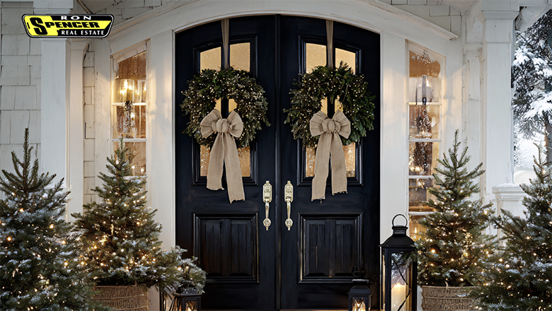 Large front doors with Christmas wreaths