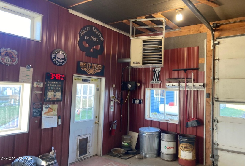 Inside of pole building with overhead propane furnace. Warms up fast.