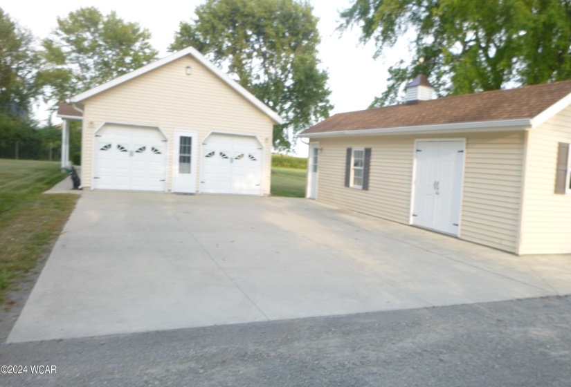 VIEW OF ATT. GARAGE & SHED/WORKSHOP BLDG