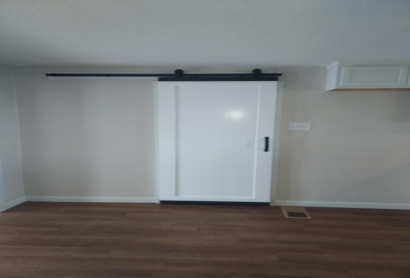 barn door to laundry