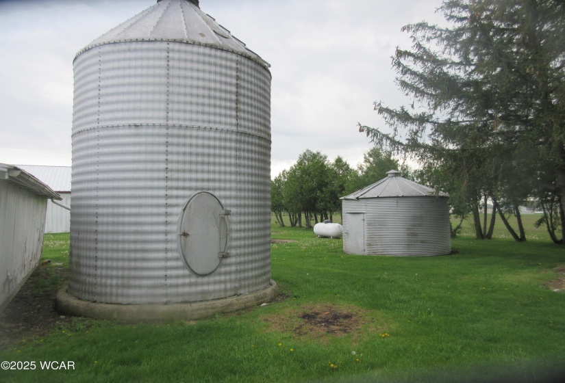 Two older grain bins