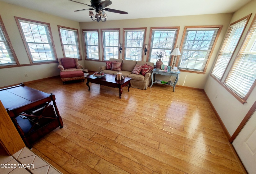 Four-season room. All new triple pane windows (2019). Heated floors.