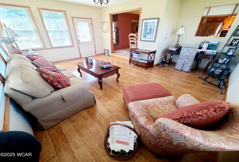 Four-season room. All new triple pane windows (2019). Heated floors.