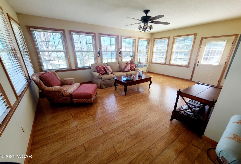 Four-season room. All new triple pane windows (2019). Heated floors.