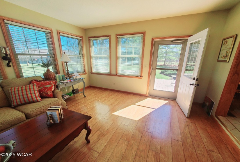 Four-season room. All new triple pane windows (2019). Heated floors.