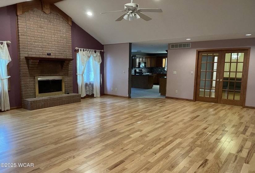 Gas Fireplace in Great room, accented by Vaulted ceiling