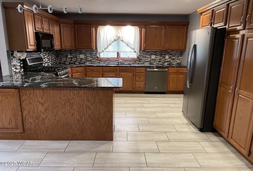 Unbelieveable Kitchen with overabundance of cabinetry and Solid Surface CT. All appliances stay