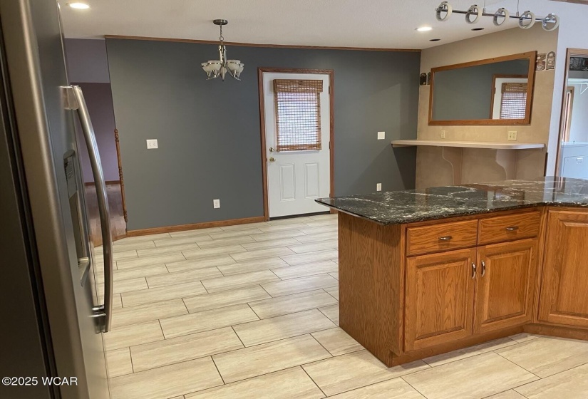 Breakfast area in Kitchen with access to deck