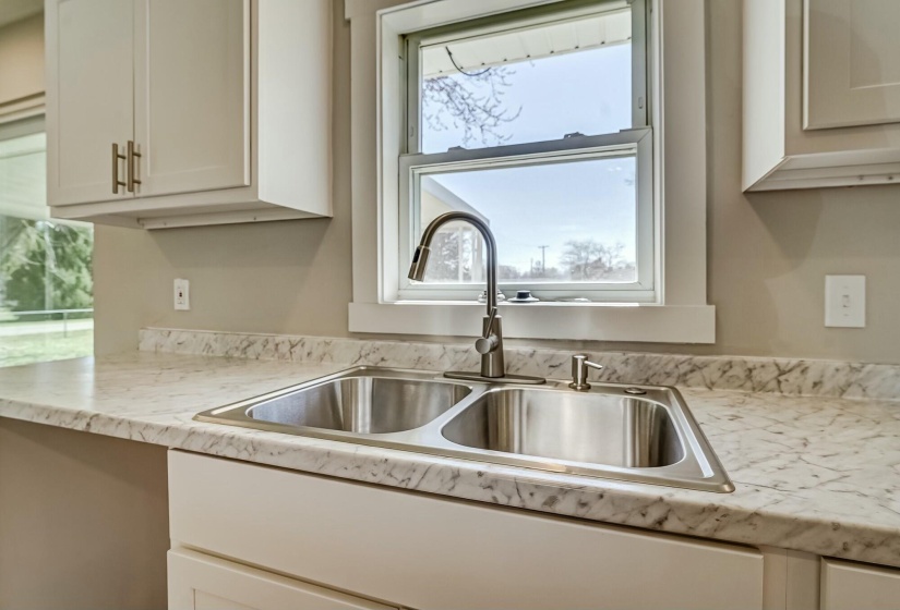 Kitchen sink w/window to backyard