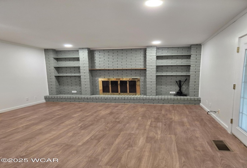 Family Room with Woodburning Fireplace