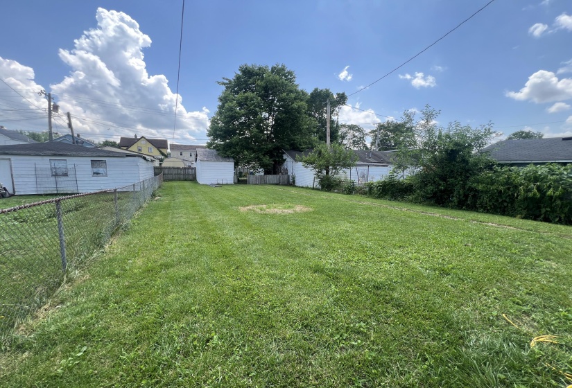 Back Yard Leading To Garage