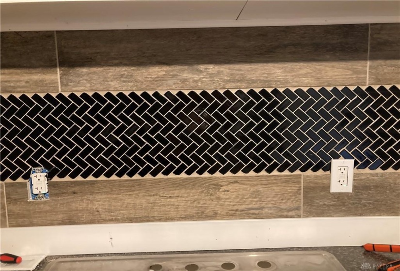ceramic tile herrinbone backsplash