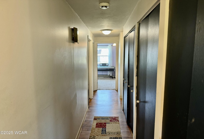 Hallway with closets