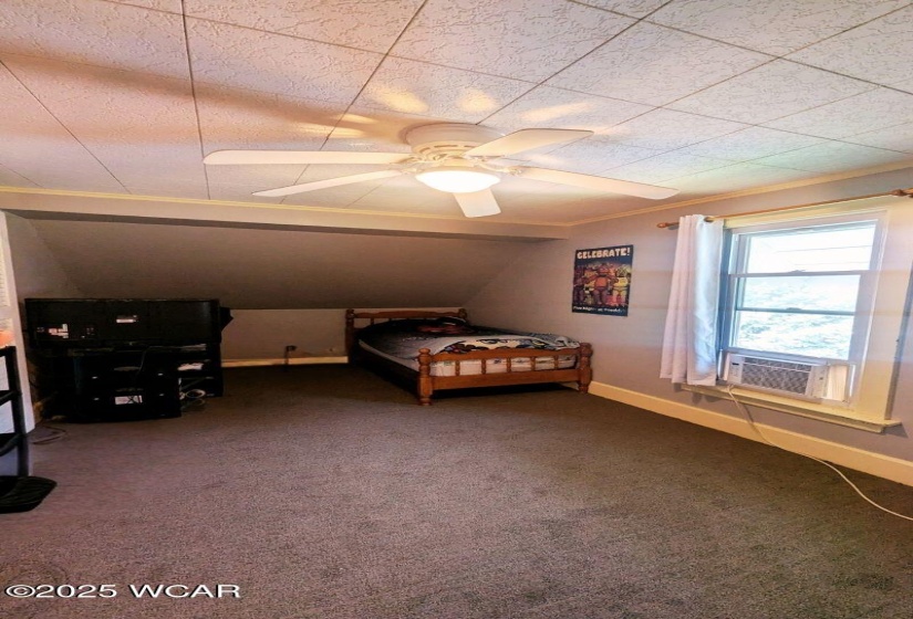 Second bedroom suite with full bathroom on second floor.