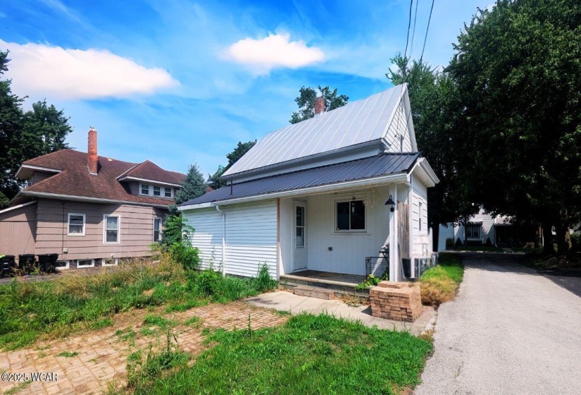 Covered back porch and the home is situated on over quarter of an acre.