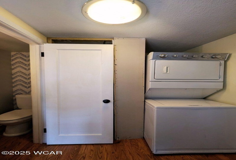 Laundry and half bathroom off of the kitchen.
